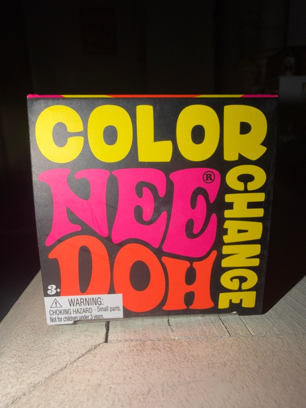 Color NEE-DOH Color Change Toy - Bright Yellow squishy ball changes color